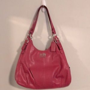 Authentic Coach leather handbag with matching wallet.